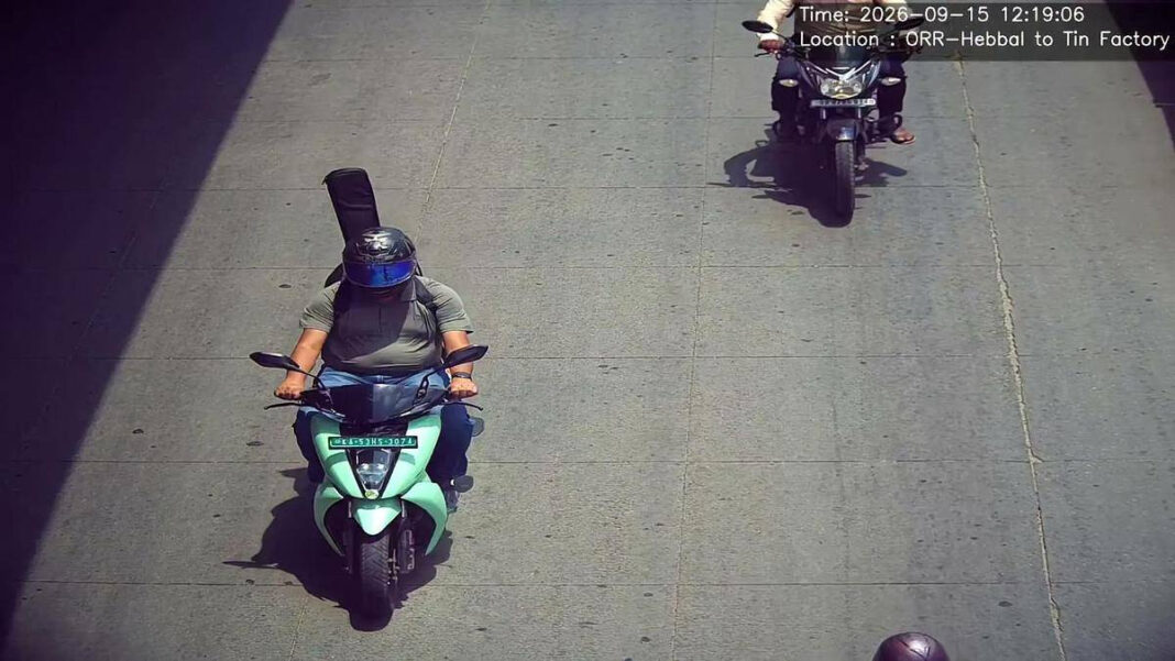 AI Camera Misidentifies Guitar as Pillion Rider in Bengaluru, Issues Helmet Fine "AI Camera Mistakenly Fines Guitar as Pillion Rider in Bengaluru"