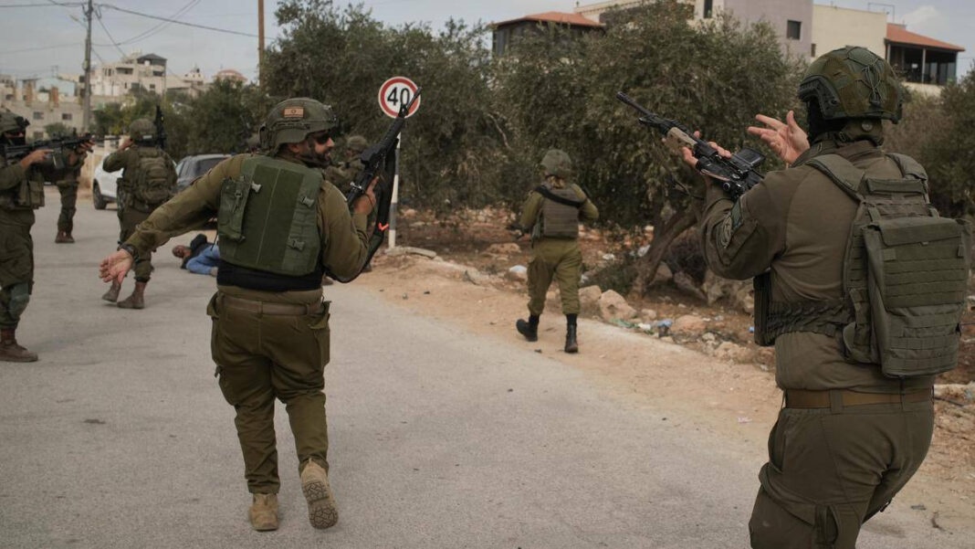 Violence in West Bank: Israeli Settlers Torch Olive Trees and Injure Journalist "Israeli Settlers Attack Olive Trees and Journalist in West Bank Violence"